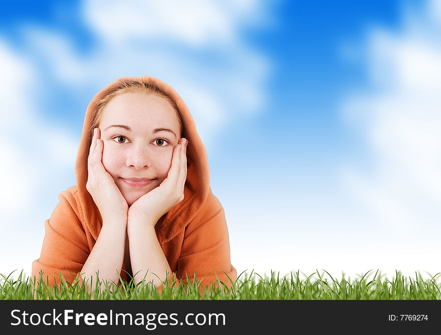 Woman on a meadow in grass