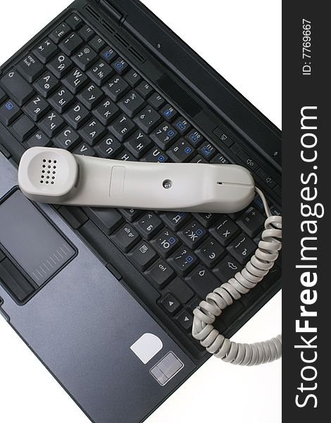 Computer and phone isolated on a white background. Computer and phone isolated on a white background