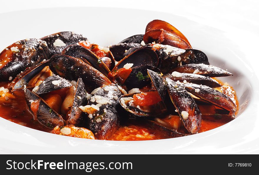 Mussels Bowl with Spice Sauce Isolated on White Background. Mussels Bowl with Spice Sauce Isolated on White Background