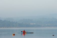 Sillouette Of Man Kayaking Stock Photography