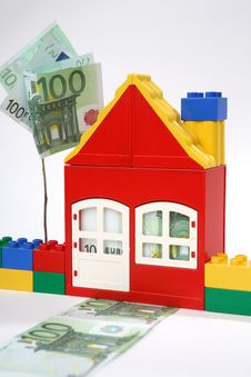House With Banknotes - Save Money. Royalty Free Stock Photography House With Banknotes - Save Money. Royalty Free Stock Photography