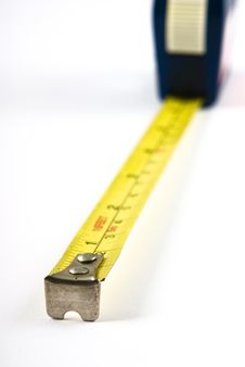 Measuring Tape Isolated On White Pointing Left Royalty Free Stock Photo