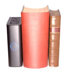 Old Leather Bound Books With A Computer Hard Drive Royalty Free Stock Image Old Leather Bound Books With A Computer Hard Drive Royalty Free Stock Image