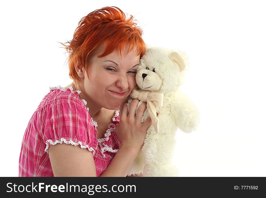 Red haired woman with teddy bear isolated on white background