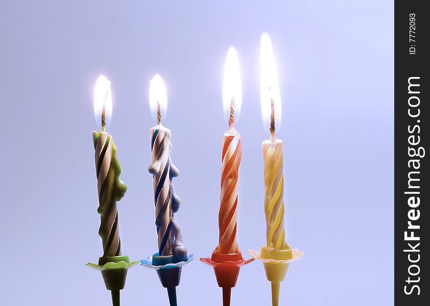 4 birthday candles close up