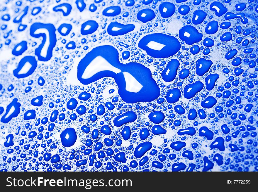 Some water drops on blue background