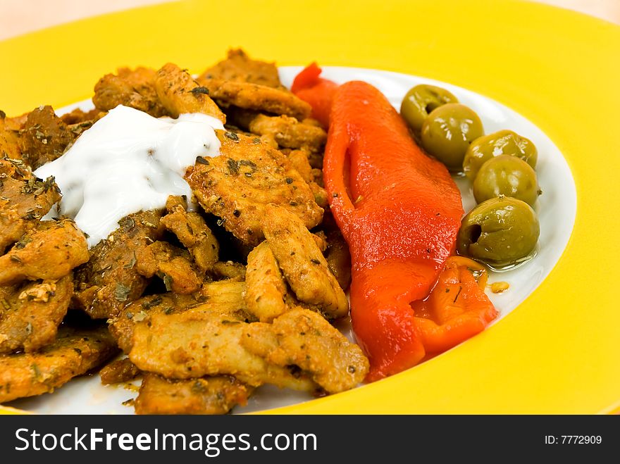 Grilled Meat With Baked Red Bell Pepper, Olive, Salad And Sauce.