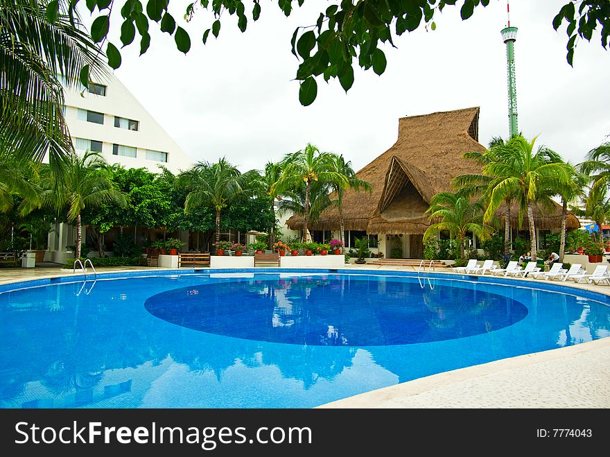 Resort swimming pool in caribbean cancun