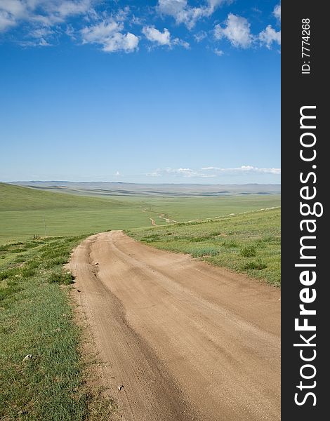 Remote road on the stepps of Mongolia Central Asia. Remote road on the stepps of Mongolia Central Asia