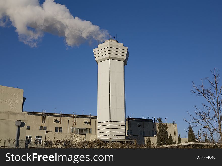 Large cloud of steam coming from a stack. Large cloud of steam coming from a stack