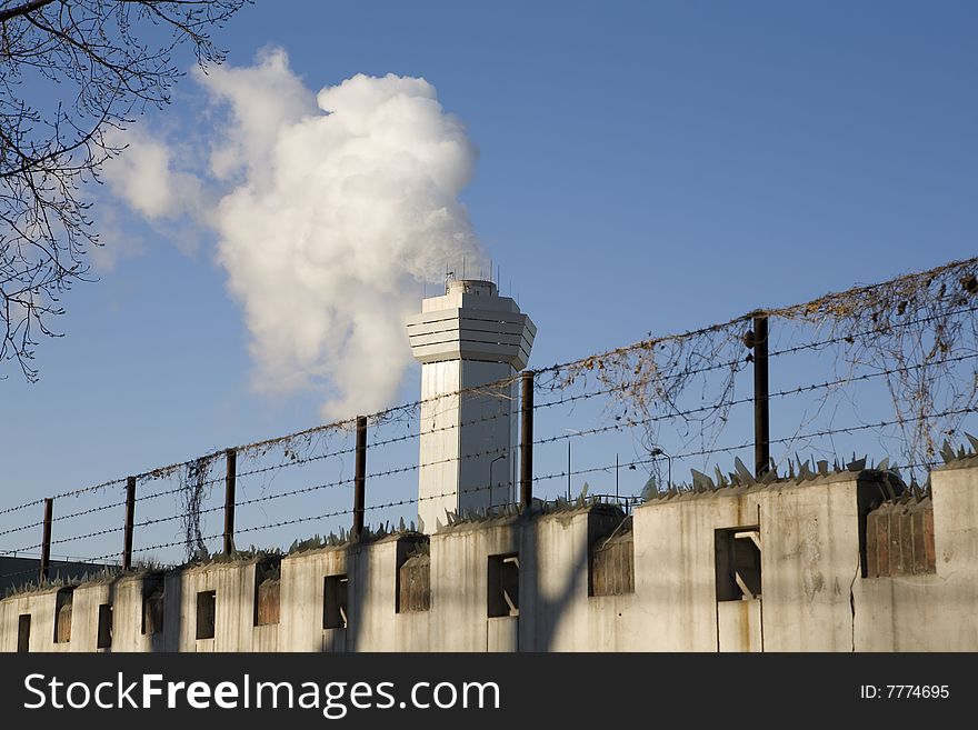 Large cloud of steam coming from a stack. Large cloud of steam coming from a stack