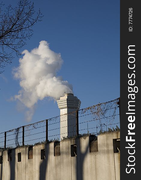 Large cloud of steam coming from a stack. Large cloud of steam coming from a stack