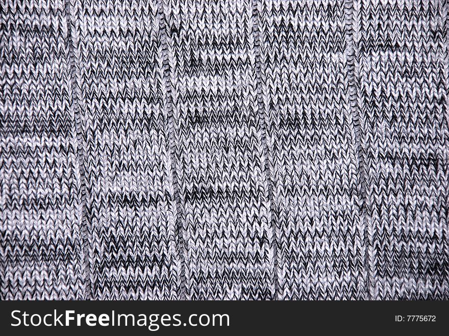 Close-up beige fabric textile texture to background. Close-up beige fabric textile texture to background