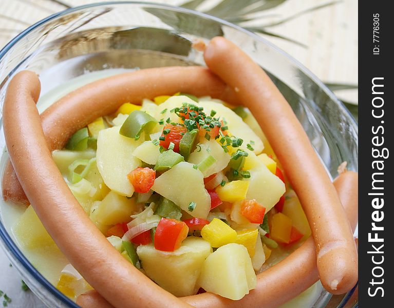 A fresh soup of potatoes with sausages
