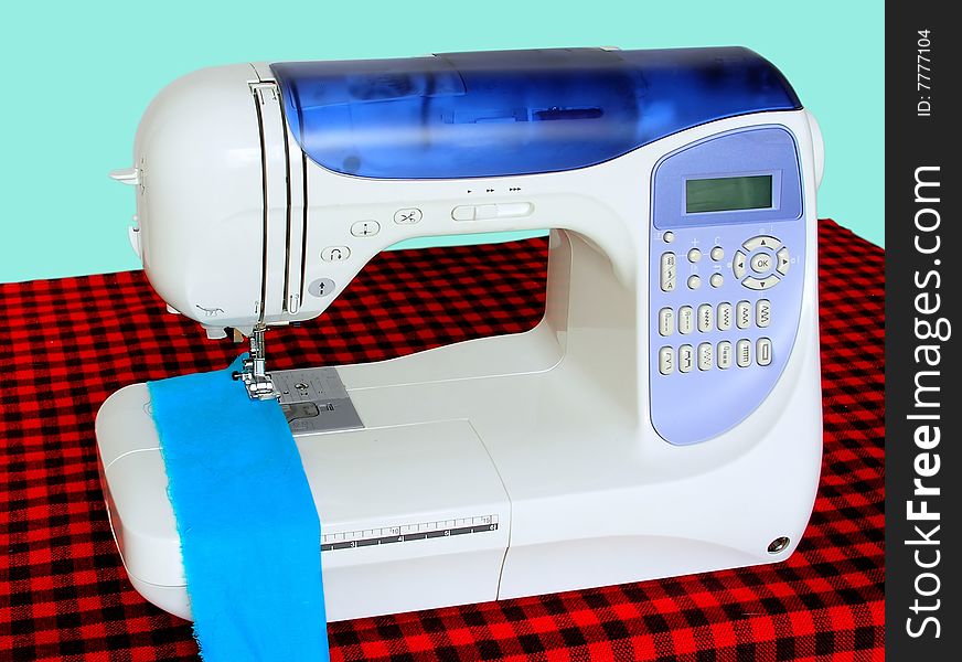 Front view of a modern electric sewing machine.