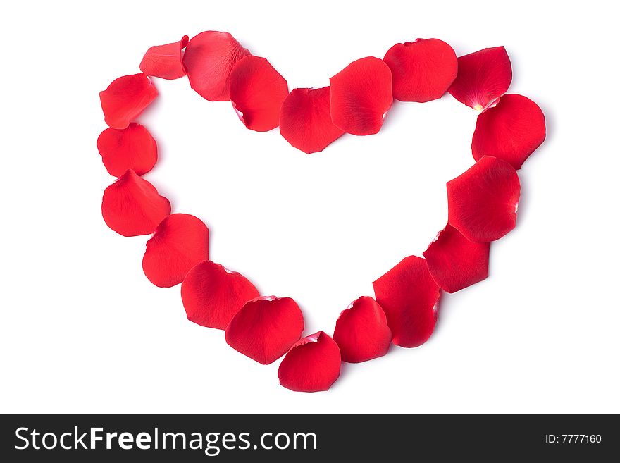 Heart of red rose petals isolated on white