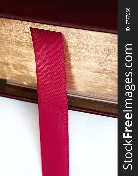 Closeup of a bible with a red ribbon