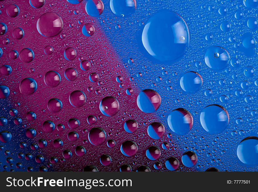 Blue and pink water drops background