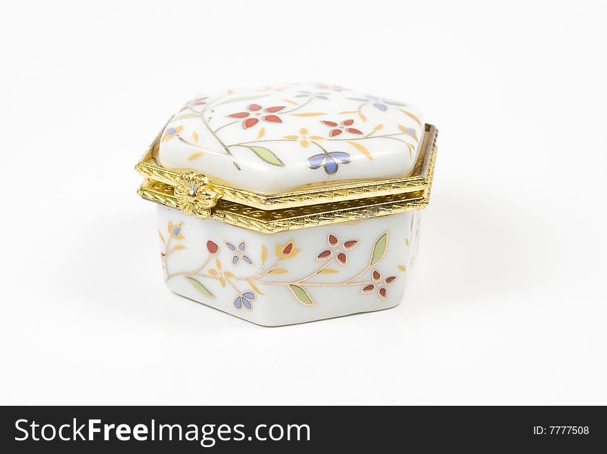 White box with costume jewellery and ornaments