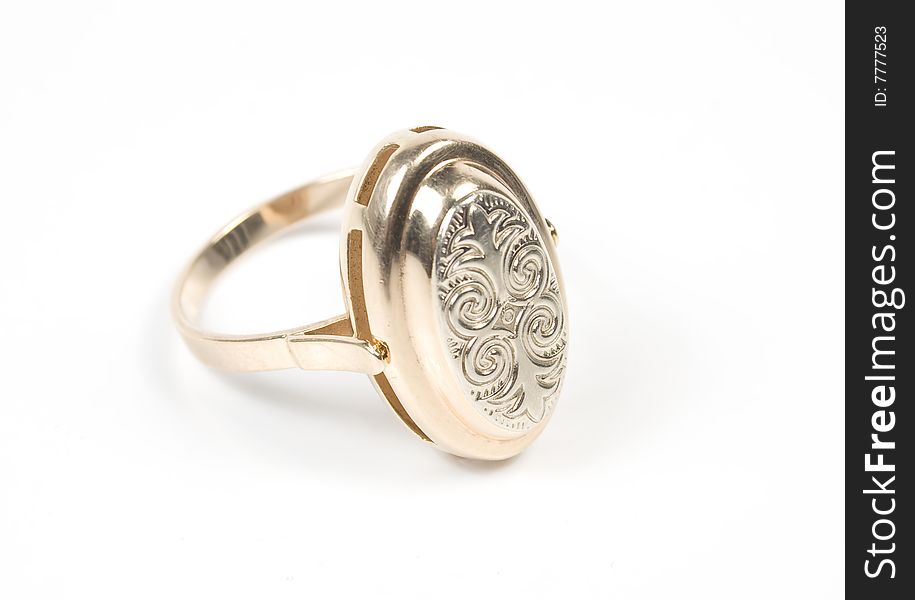 Original ring from gold with ornament on white