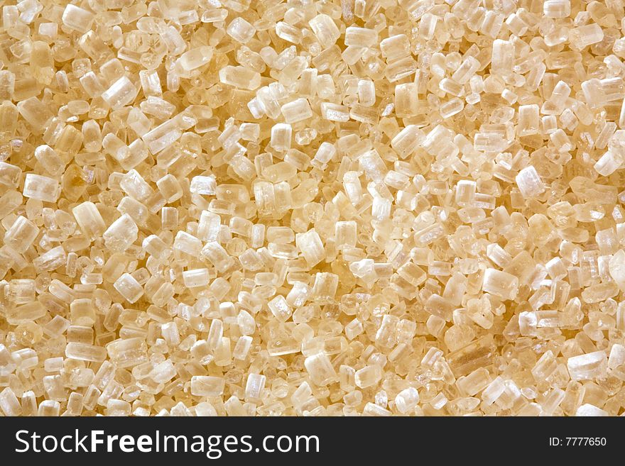 Closeup of brown sugar crystals as background. Closeup of brown sugar crystals as background