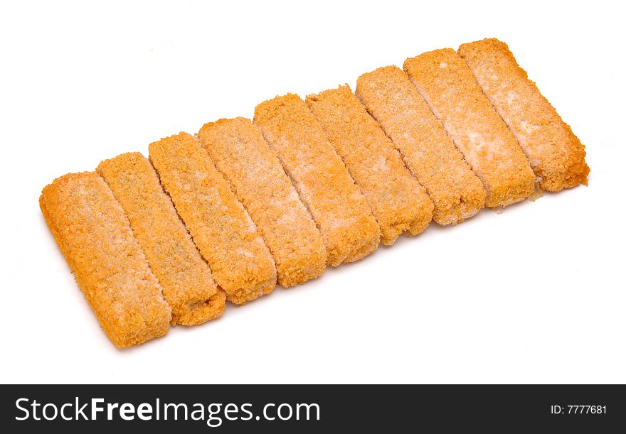 Frozen fish nuggets isolated at white