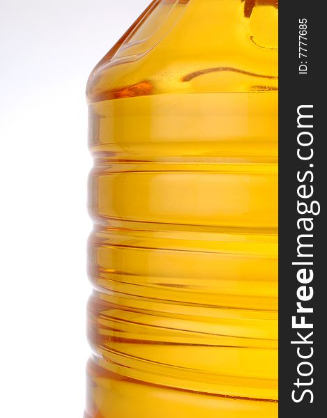 Oil bottle detail isolated at white