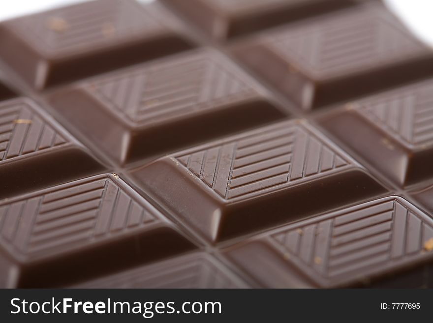 Macro of dark chocolate block background