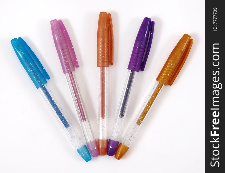 Colorful pens isolated at white