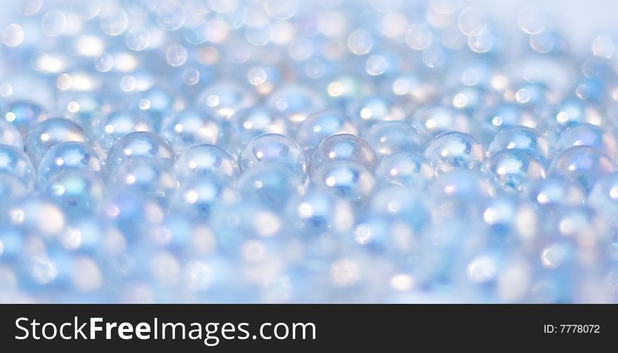 Beautiful background made of blue glass balls (shallow DOF)