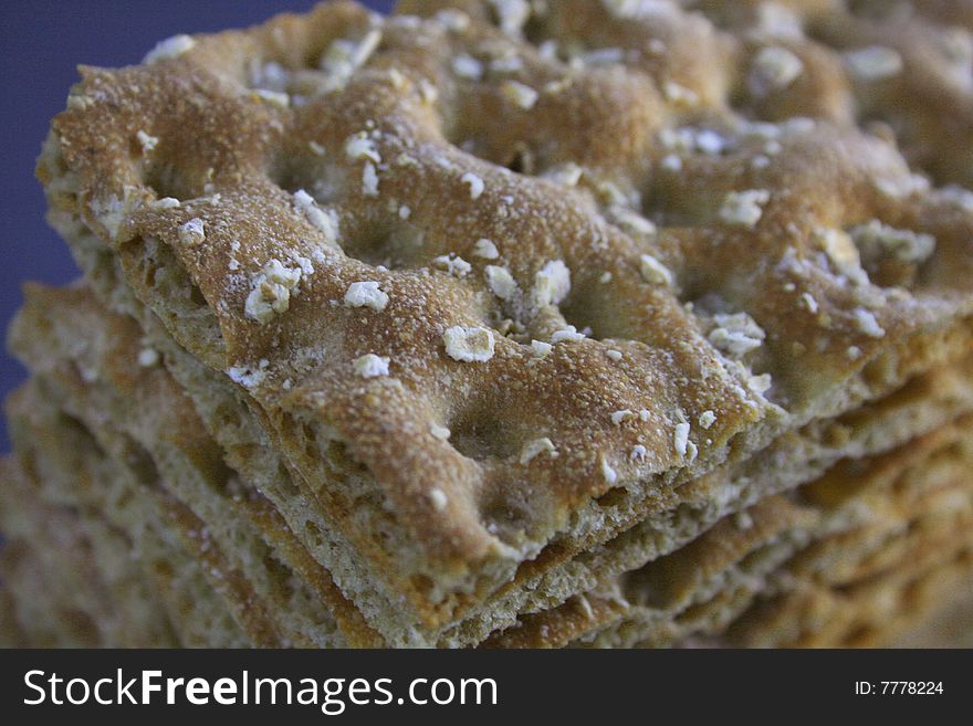 A stack of fresh, healthy crisp bread full grain bread