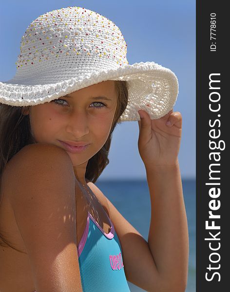 Young girl posing in th beach. Young girl posing in th beach