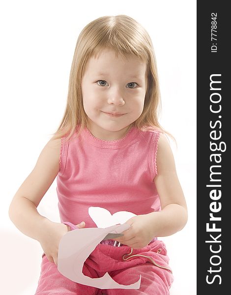 Pretty Small Girl Is Cutting Paper Heart Shape