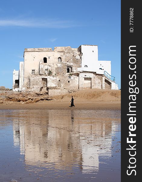 Building on the beach (mausoleum of Islamic hermit) in Sidi Kauki, Morocco
