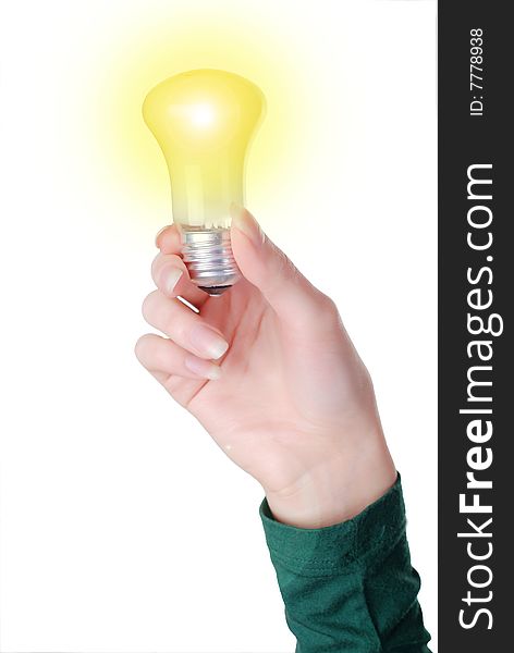 Hand of a woman with lamp on the white background. Hand of a woman with lamp on the white background