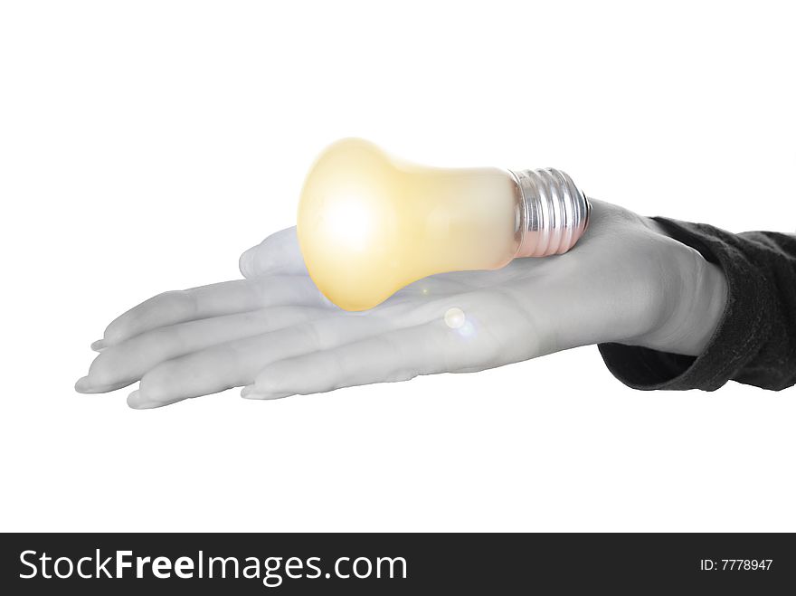 Hand of a woman with lamp on the white background. Hand of a woman with lamp on the white background