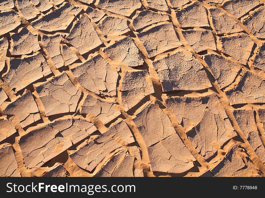 Cracked ground in Sahara desert region