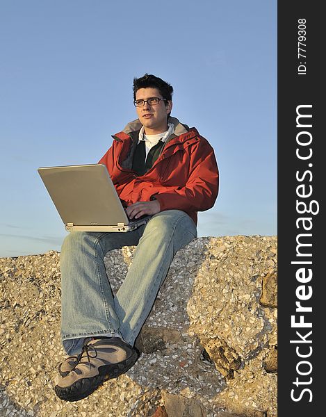 Young man with laptop