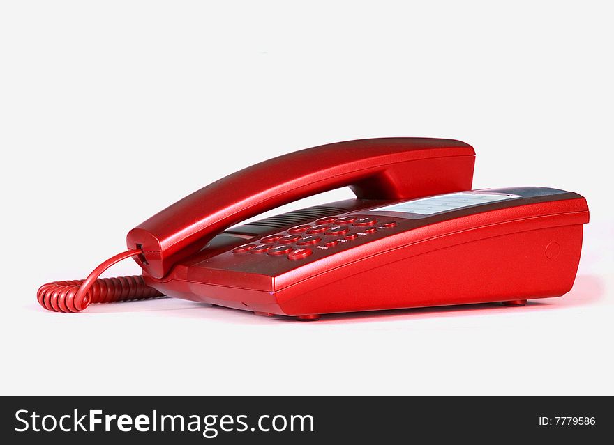 Blue office telephone on a white  background
