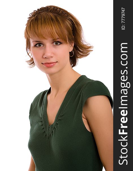 Portrait of the brunette in a dark green dress on a white background. Isolated