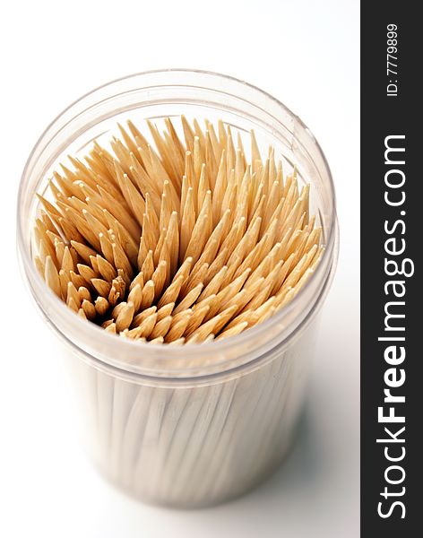 An overhead shot of a container of toothpicks.