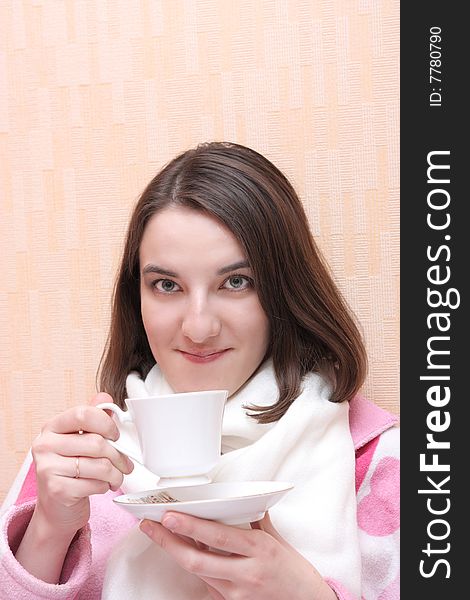 Sick girl drinks tea