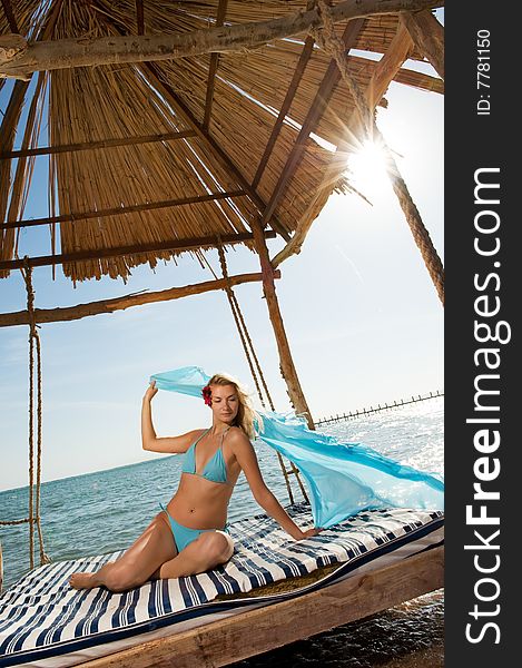 Woman relaxing near the sea