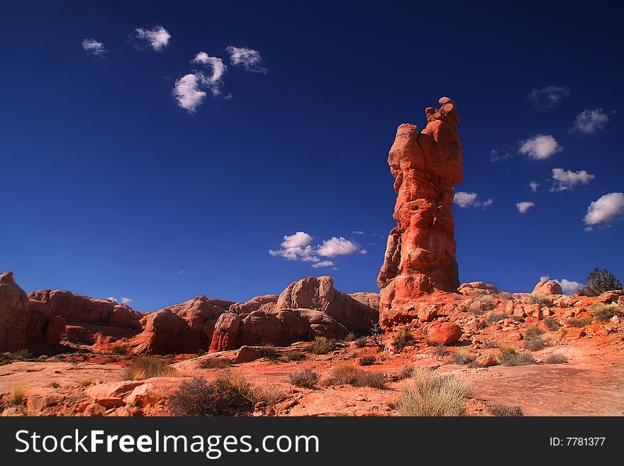 View of the red rock formations in Arches National Park with blue skyï¿½s. View of the red rock formations in Arches National Park with blue skyï¿½s