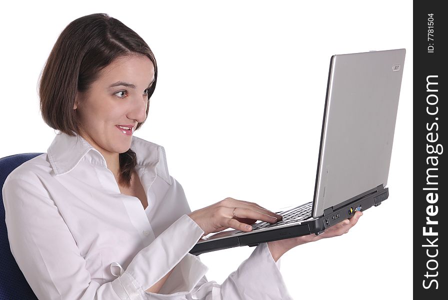 Surprised girl with laptop on white background