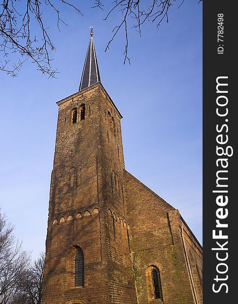 Very thin restored church tower. Very thin restored church tower.