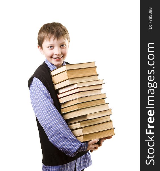 Young boy with a Stack of books. Young boy with a Stack of books