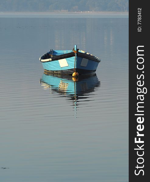 Traditional fishing boat in Ã“bidos lagoon, Portugal