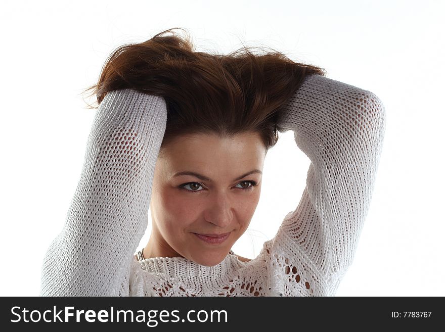 Woman in sweater isolated on white background