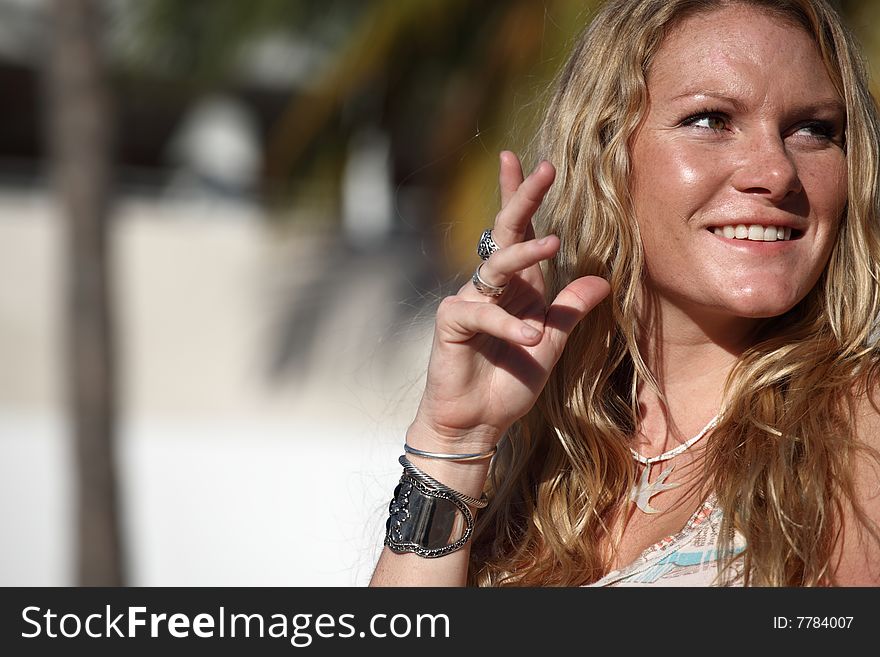 Beautiful young woman smiling at the camera. Beautiful young woman smiling at the camera